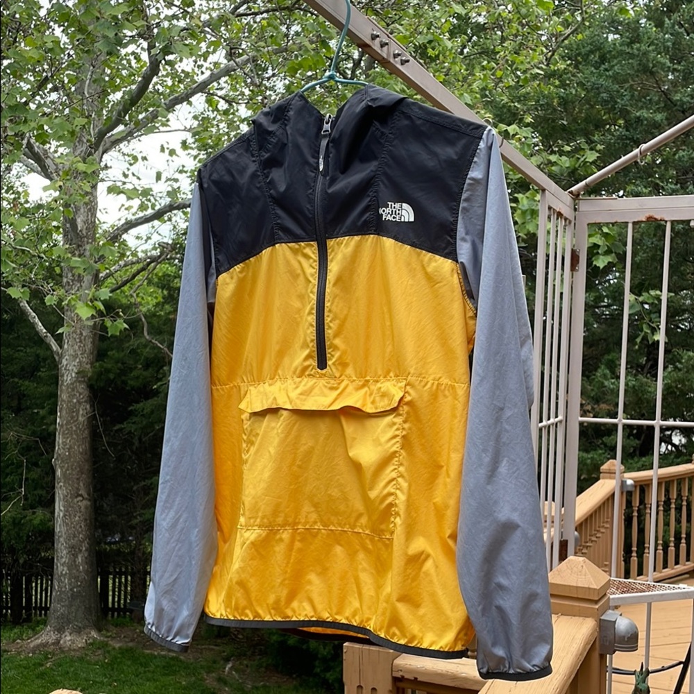 The North Face Yellow and Black Windwall Pullover Jacket